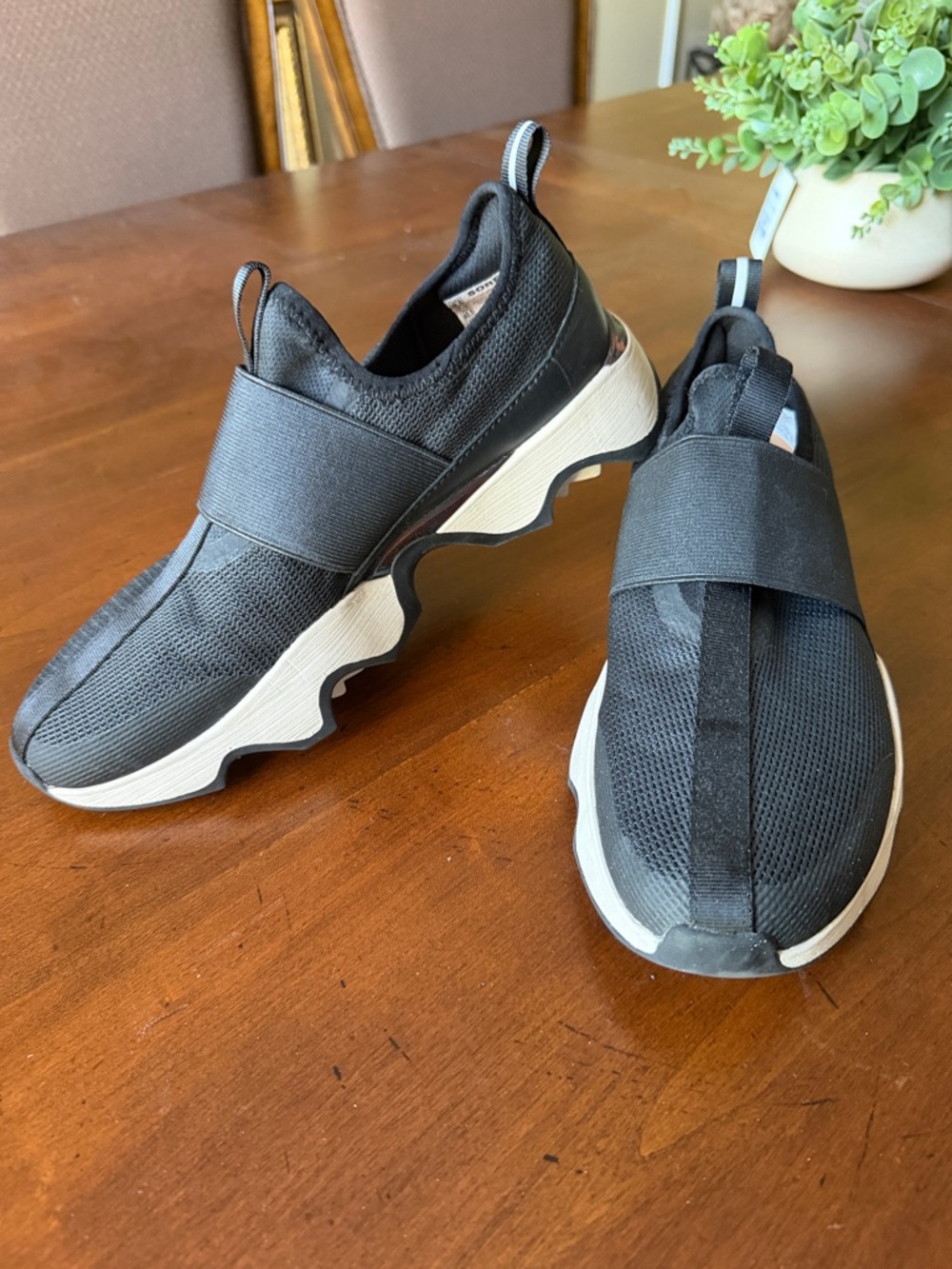 Sorel Slip-On Athletic Sneakers in Black and White